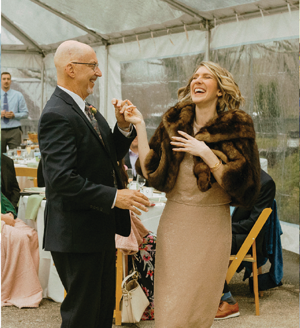 Ron Pfeffer dancing with his daughter Allison in 2023 at her wedding