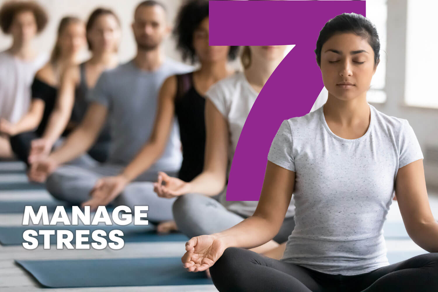 A woman meditating in a yoga class