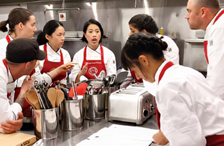 Christine Ha giving instructions to her team during the 2012 MasterChef competition.