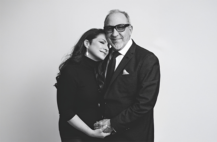 Black and white photo of Gloria Estefan with Emilio, her husband.