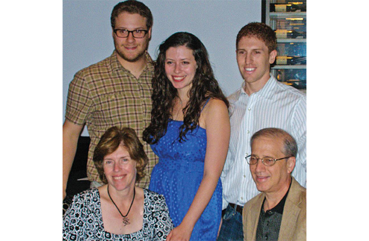 Seth and Laura Rogan pictured with Laura's parents for their wedding anniversary