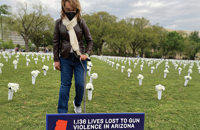 Giffords at a memorial for victims of gun violence.