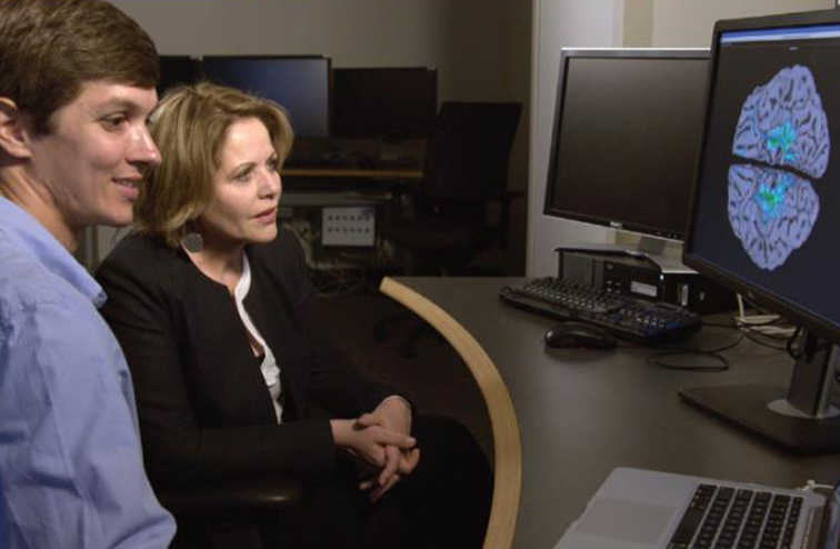 Fleming Reviewing fMRI data with NIH scientist David Jangraw in 2017