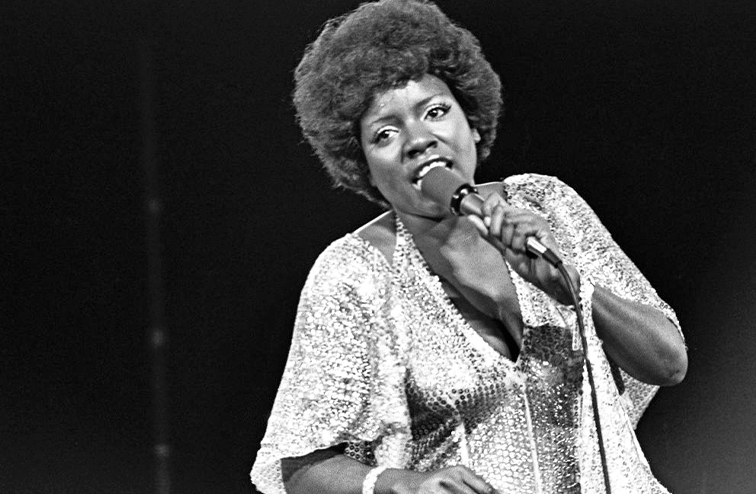 A black and white photo of Gaynor performing in 1978 before the accident