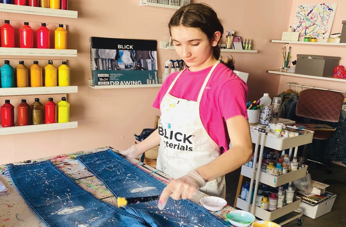 Teen with cerebral palsy paints jeans for celebrities and raises funds for art therapy