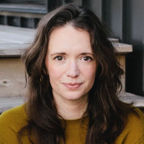 Author, essayist, and speaker Jessica Slice, wearing an olive green sweater. 