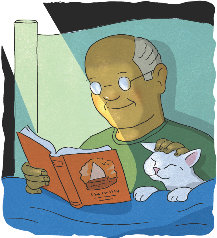 Man reading a book in bed while petting his cat