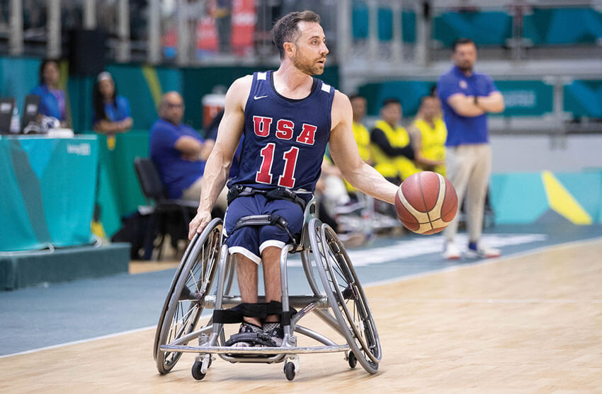 Steve Serio playing wheelchair basketball
