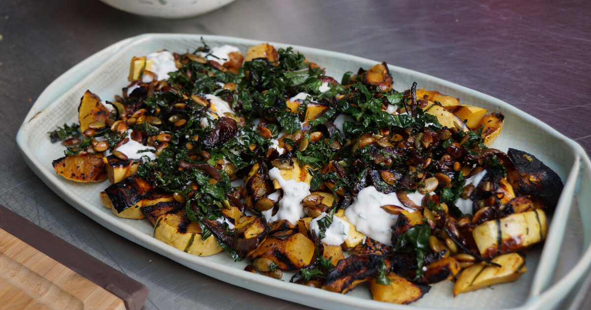 Roasted delicata squash with spiced yogurt sauce